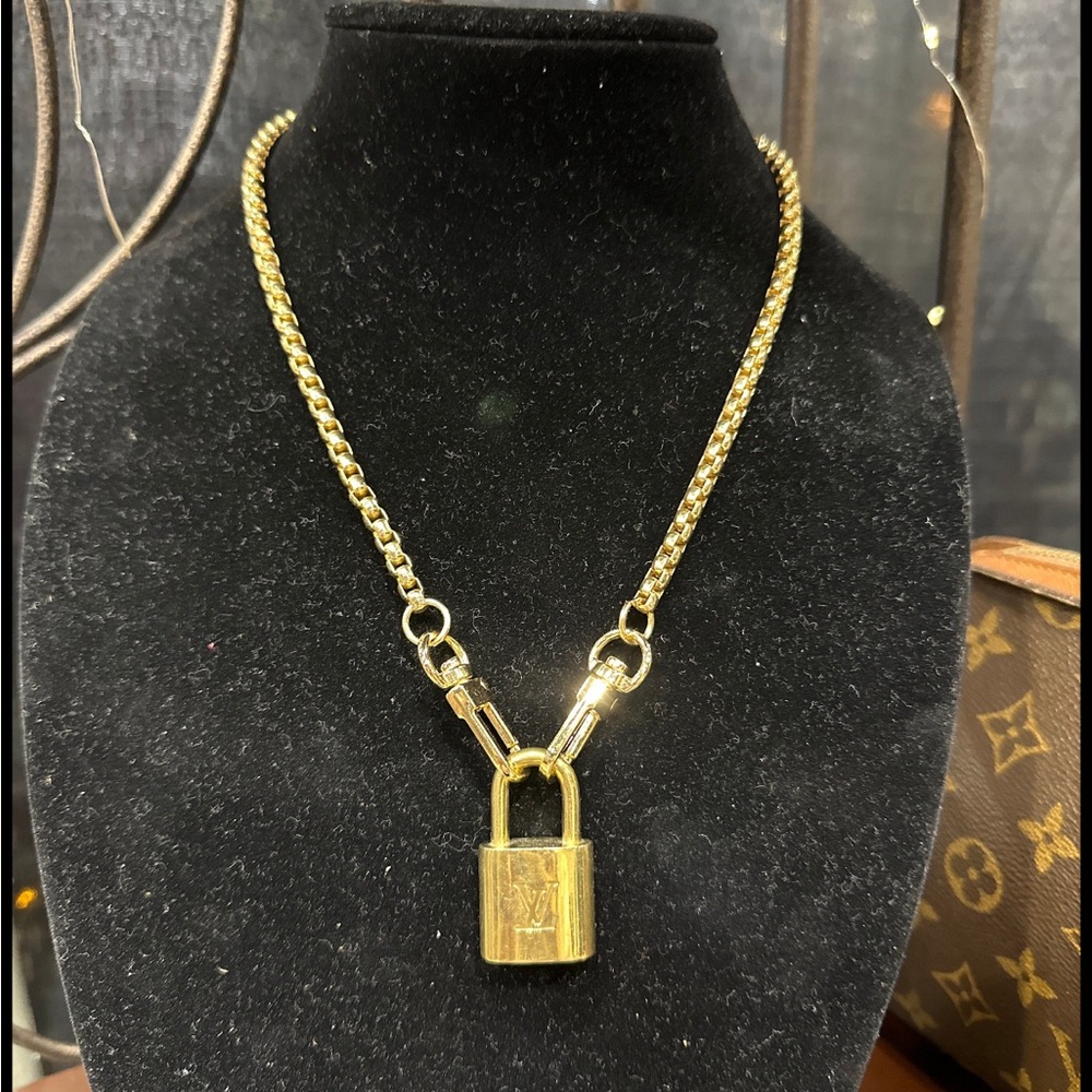 Louis Vuitton lock (come with generic chain necklace)